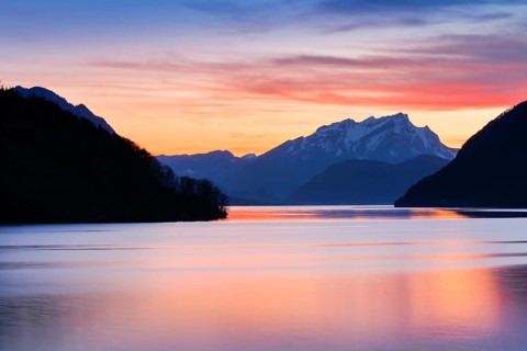 Lake with mountains in the background