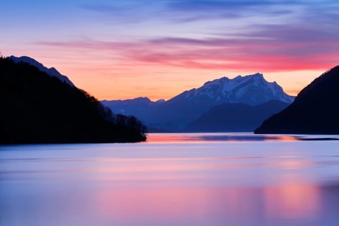 Lake with mountains in the background