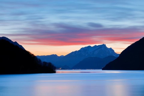 Lake with mountains in the background