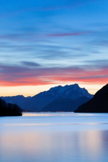 Lake with mountains in the background