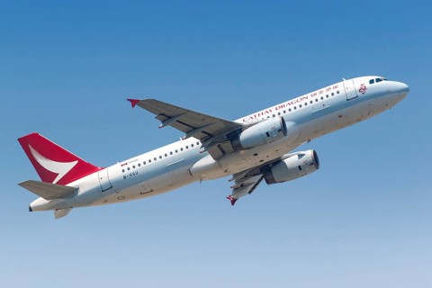 A Cathay Dragon Airbus A320 aircraft with registration B-HSU at Hong Kong Airport
