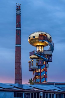 Kuchlbauer Tower or Hundertwasser Tower by Friedensreich Hundertwasser and Peter Pelican with chimney of the Kuchlbauer brewery