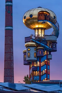 Kuchlbauer Tower or Hundertwasser Tower by Friedensreich Hundertwasser and Peter Pelican with chimney of the Kuchlbauer brewery