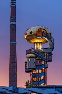 Kuchlbauer Tower or Hundertwasser Tower by Friedensreich Hundertwasser and Peter Pelican with chimney of the Kuchlbauer brewery