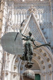Bronze statue Giraldillo in front of the main entrance