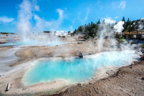 Steaming hot springs with turquoise water