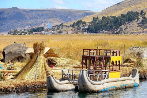 Typical reed boats at a floating island of the Uro