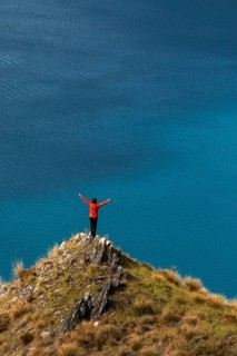 Guy on a mountain at Lake Hawea