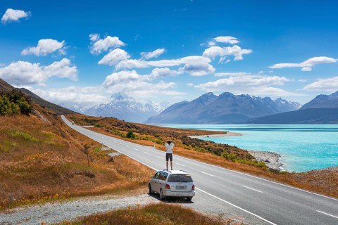 Guy on a car roof
