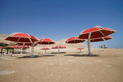 Abandoned parasols on the beach