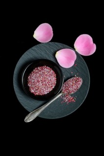 Rose salt in bowl and spoon