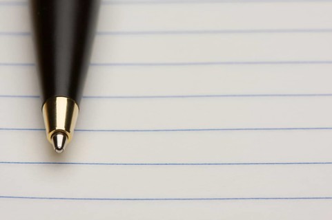 Pen and pad of lined paper