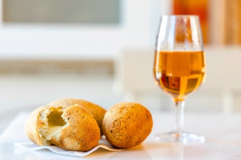 Delicious cod fish cake stuffed with cheese served in Porto
