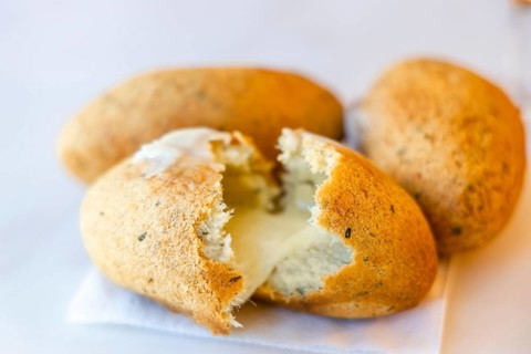 Delicious cod fish cake stuffed with cheese served in Porto