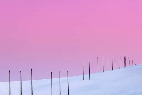 Electricity pylons in winter landscape