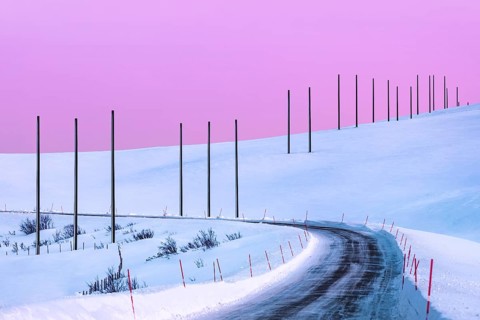 Electricity pylons in winter landscape