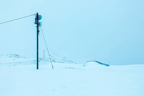 Snowed-in car in winter