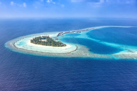 Maldives island holiday sea panorama text free space copyspace Halaveli Resort Ari Atoll aerial photo tourism