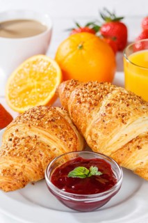 Croissant breakfast croissants food juice orange juice coffee hotel buffet in germany