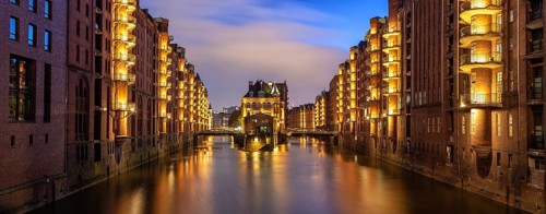 Moated castle Speicherstadt castle panorama at night in Hamburg