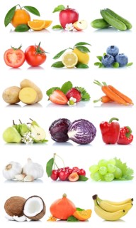 Fruit and vegetables fruits apple orange lemon berries carrots bananas cropped isolated against a white background in Germany