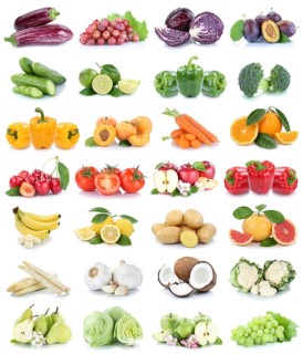 Fruits and vegetables fruits apple tomatoes bananas oranges lemon grapes colors collage cropped isolated against a white background in Germany
