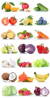 Fruit and Vegetable Fruits Apple Orange Lemon Berries Carrot Salad isolated on a white background in Germany