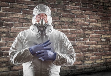 Chinese man wearing hazmat suit