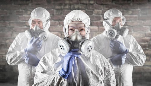 Chinese woman and team behind in hazmat suites