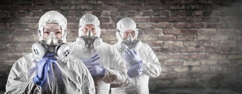 Chinese woman and team behind in hazmat suites
