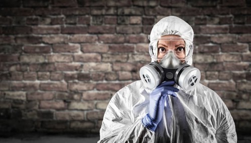 Woman wearing hazmat suit