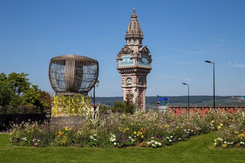 Champagne cork art and tower of the De Castellane champagne house