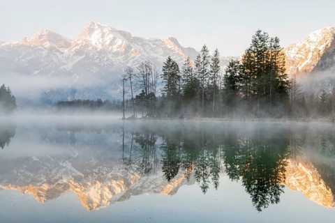 Alpine lake with reflection