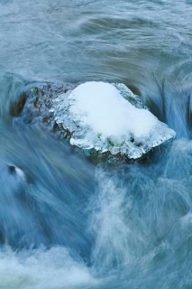 Icicles on wild river in nature reserve Hoelle