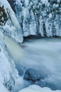 Icicles on the bank of the torrent Hoellbach