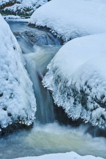 Icicles on the bank of the torrent Hoellbach