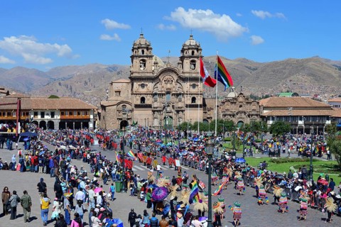 Plaza de Armas with Cathedral Catedral Basilica de la Virgen de la Asuncion during a parade