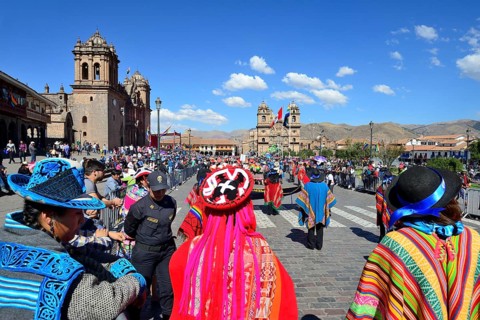 Plaza de Armas with Cathedral Catedral Basilica de la Virgen de la Asuncion during a parade