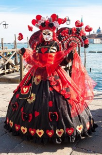Woman in carnival constume and mask on carnival in Venice