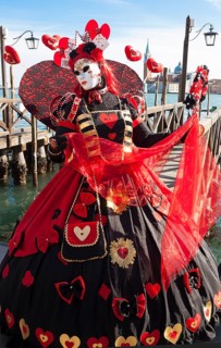 Woman in carnival constume and mask on carnival in Venice