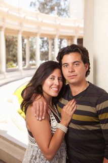 Happy attractive hispanic couple enjoying themselves at the park