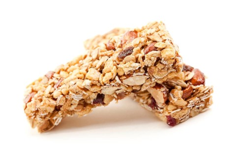 Two nutritious granola bars isolated on white