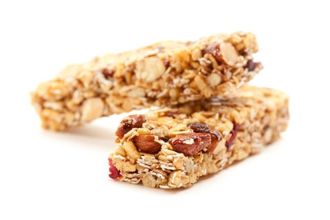 Two nutritious granola bars isolated on white