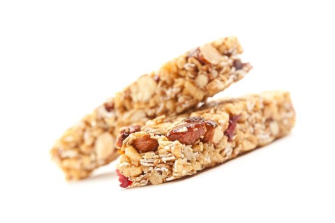 Two nutritious granola bars isolated on white
