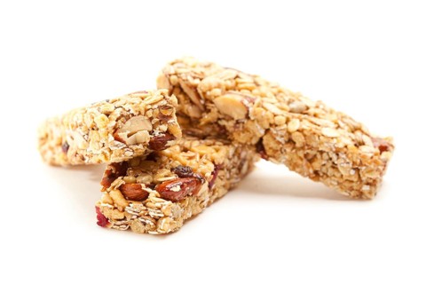 Two nutritious granola bars isolated on white