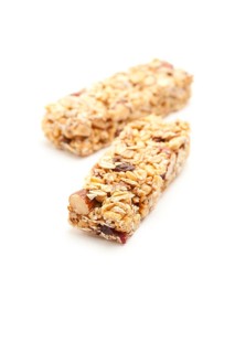 Two nutritious granola bars isolated on white