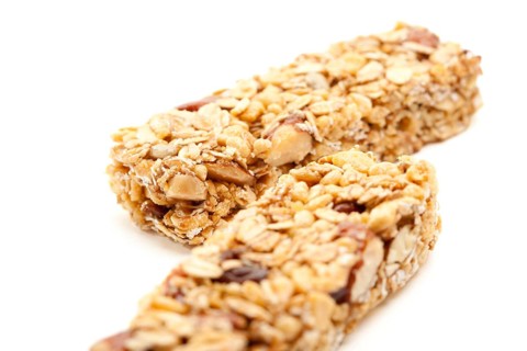 Two nutritious granola bars isolated on white