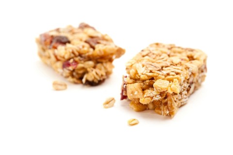 Broken granola bar isolated on a white background