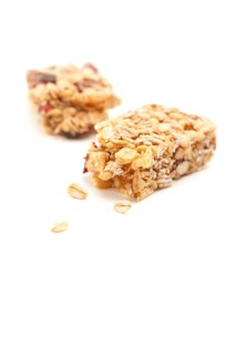 Broken granola bar isolated on a white background