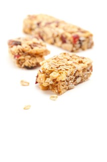 Broken granola bar isolated on a white background